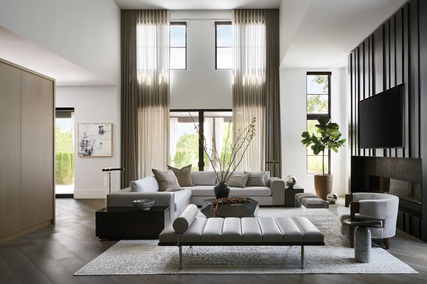 Coastal living room with large windows in Mona Vale