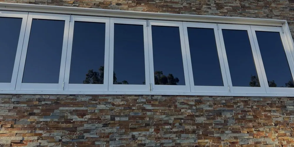 Reflective privacy film on a row of office windows