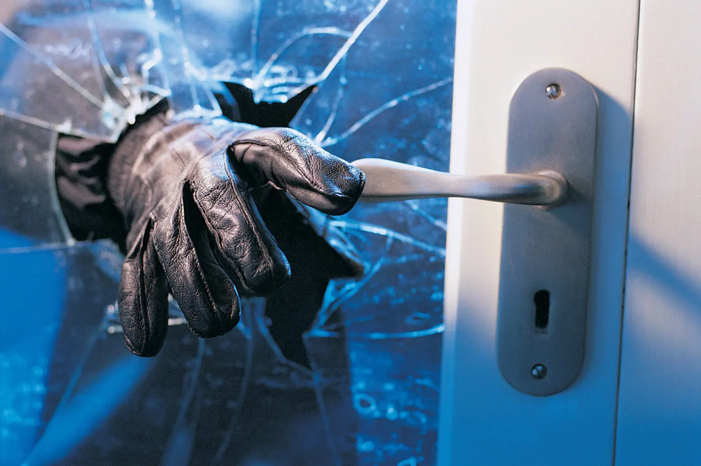 Security film holding glass together after impact
