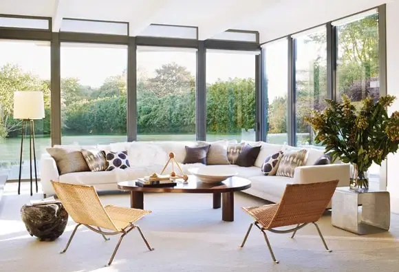 Bright living room with large windows and reduced glare